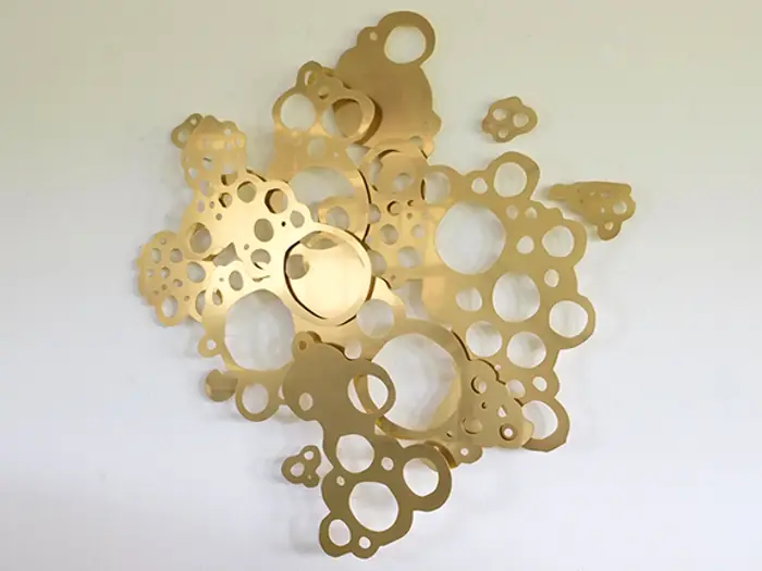 Sculptural cut-paper relief work by Andreas Kocks.