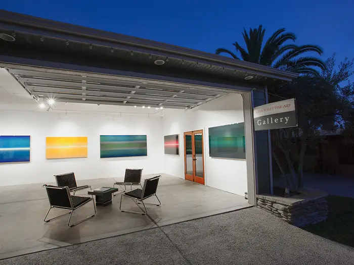 Artwork by Casper Brindle on view inside Susan Street Fine Art.
