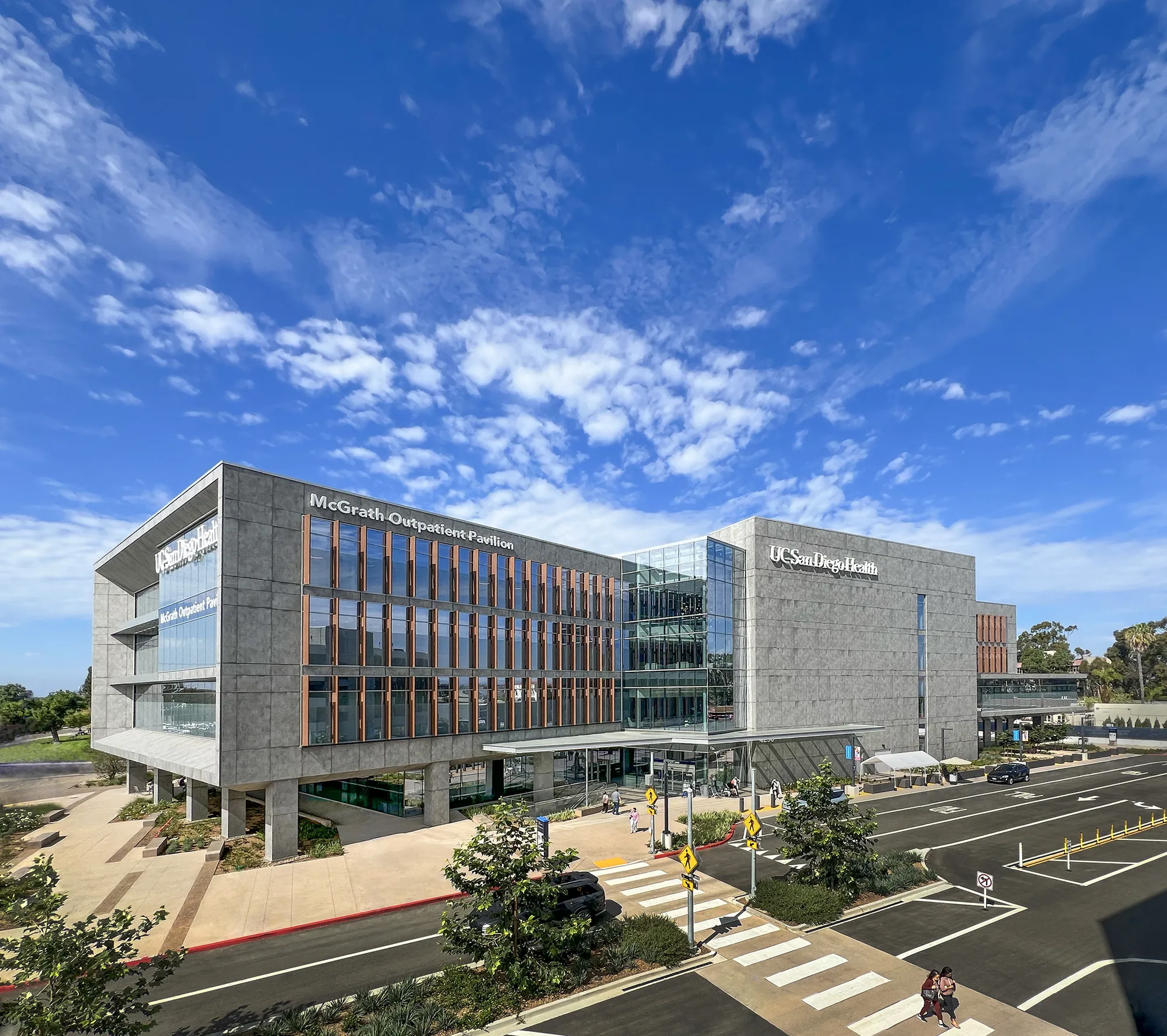UC San Diego Health McGrath Outpatient Pavilion under a blue sky — a Susan Street Fine Art consulting project.